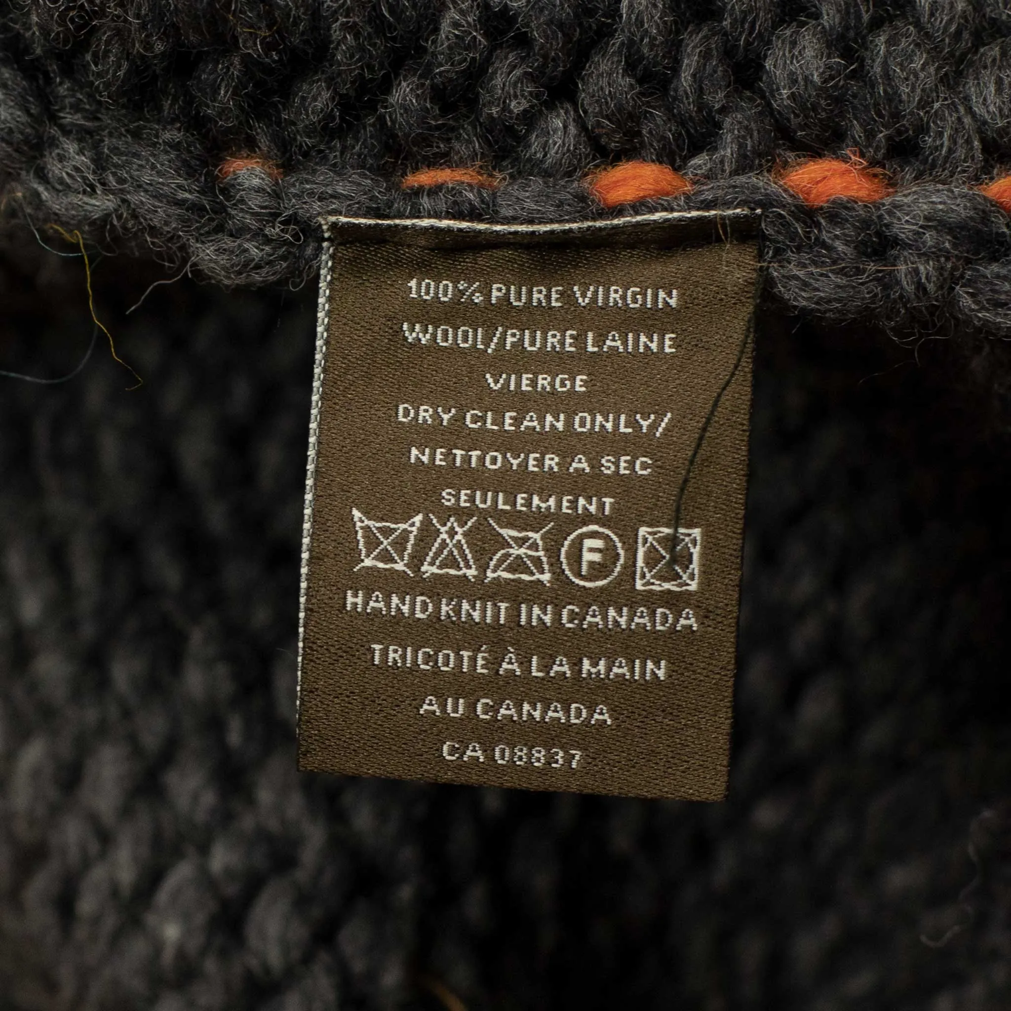 Exclusive hand-knit Cowichan cardigan in charcoal, orange, yellow and teal 6-ply, wool