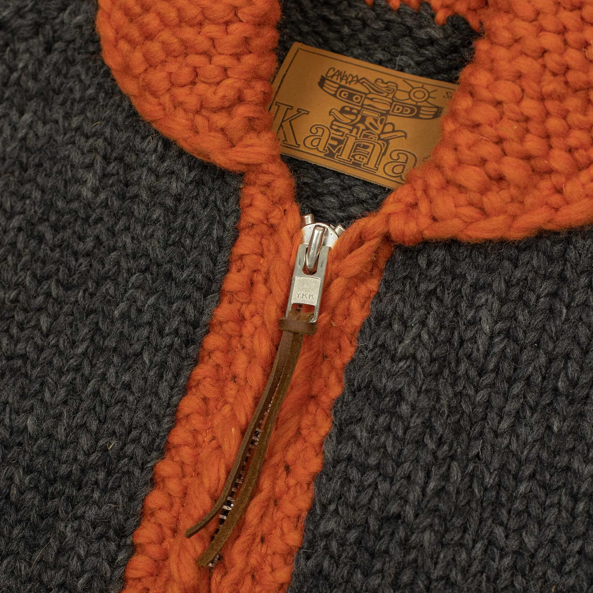 Exclusive hand-knit Cowichan cardigan in charcoal, orange, yellow and teal 6-ply, wool