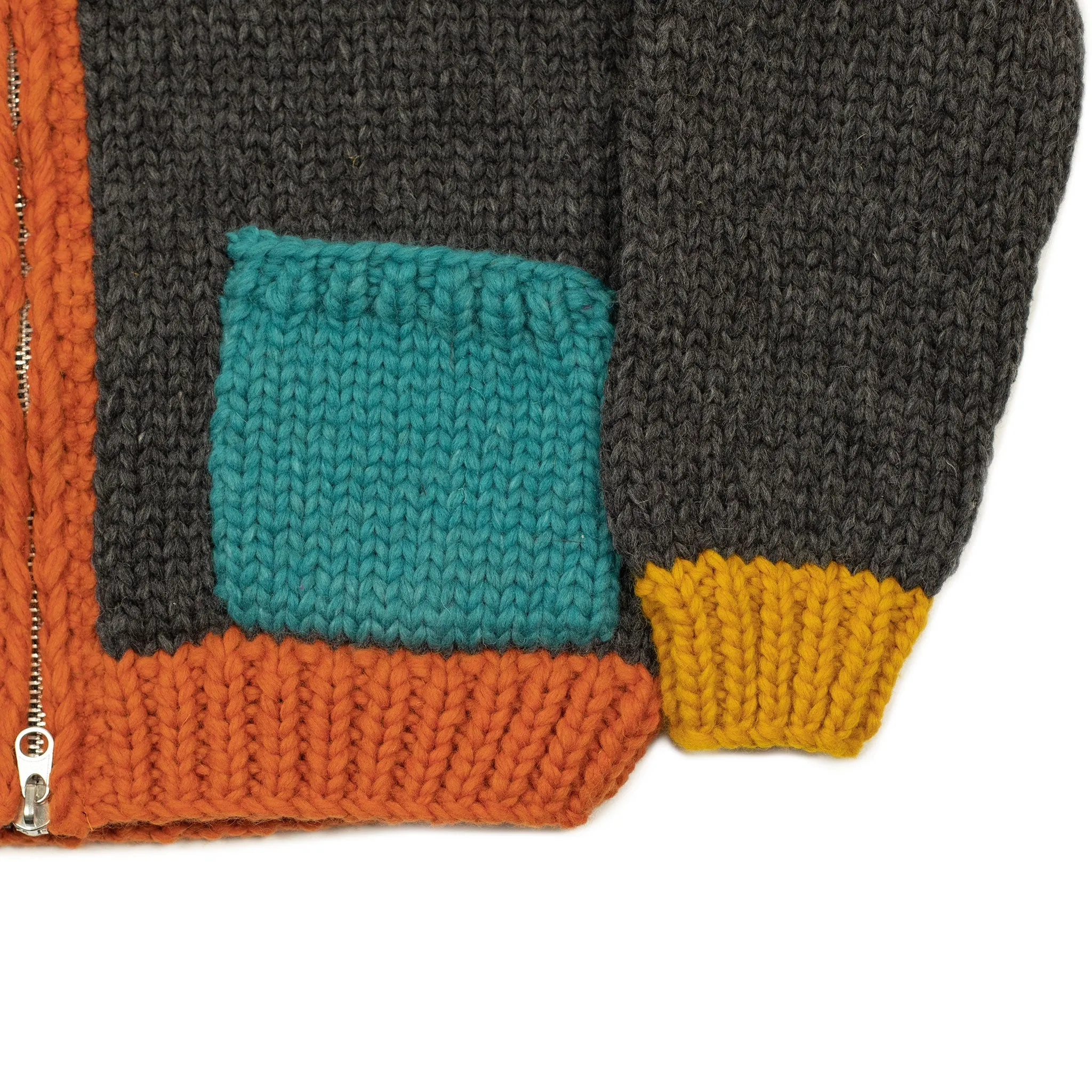 Exclusive hand-knit Cowichan cardigan in charcoal, orange, yellow and teal 6-ply, wool