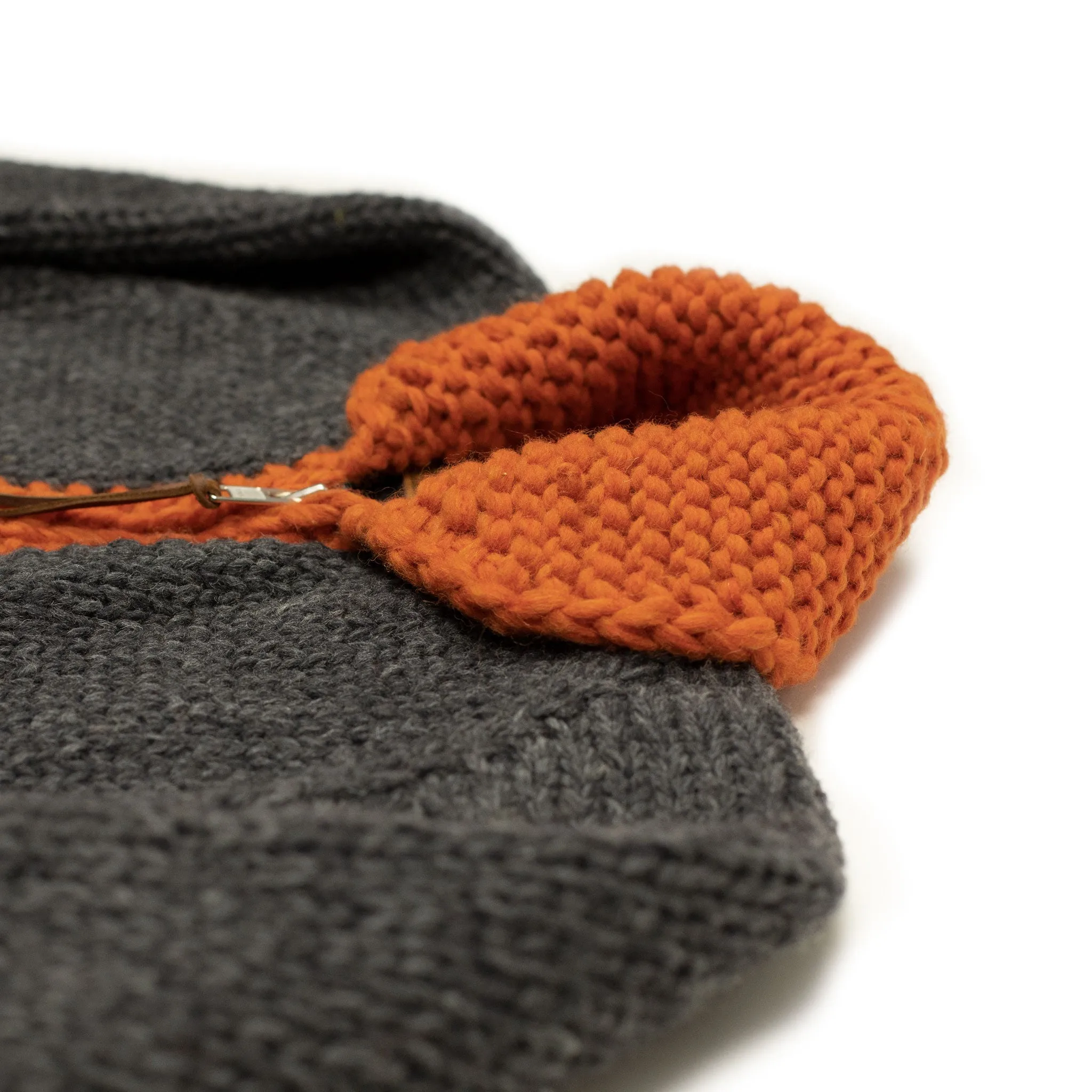 Exclusive hand-knit Cowichan cardigan in charcoal, orange, yellow and teal 6-ply, wool