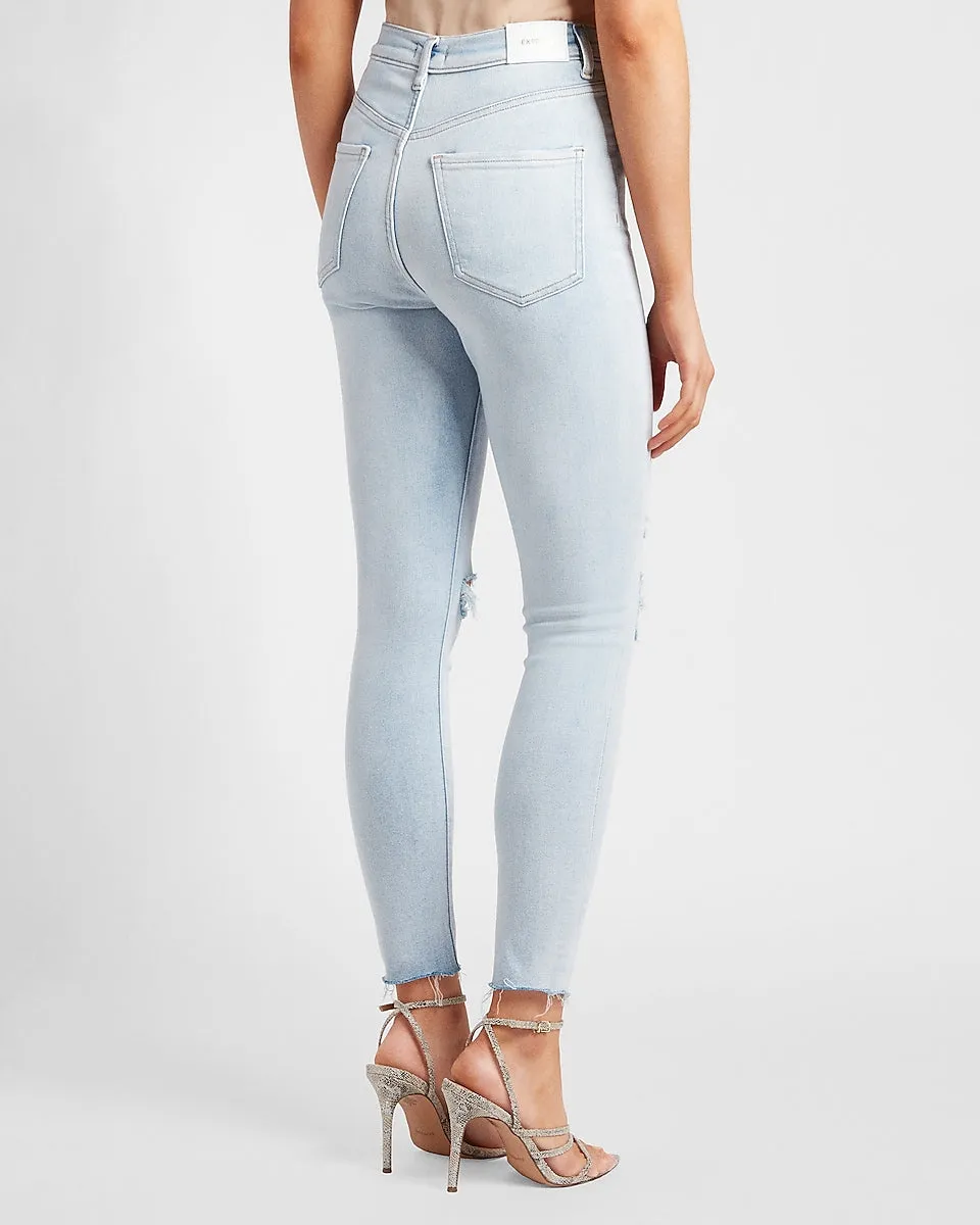 Super High Waisted Ripped Raw Hem Skinny Jeans in Medium Wash