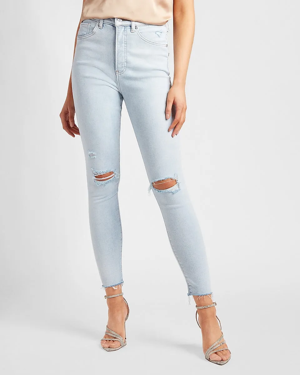 Super High Waisted Ripped Raw Hem Skinny Jeans in Medium Wash