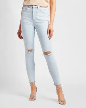 Super High Waisted Ripped Raw Hem Skinny Jeans in Medium Wash